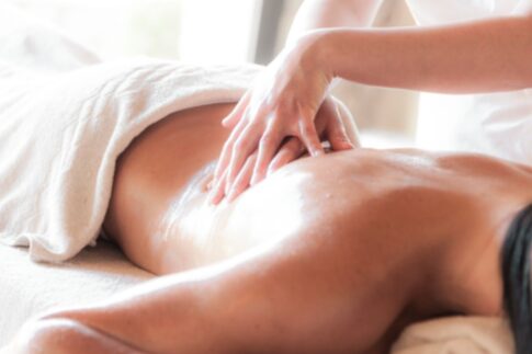 A soothing massage session in a serene spa environment promoting relaxation and wellness.